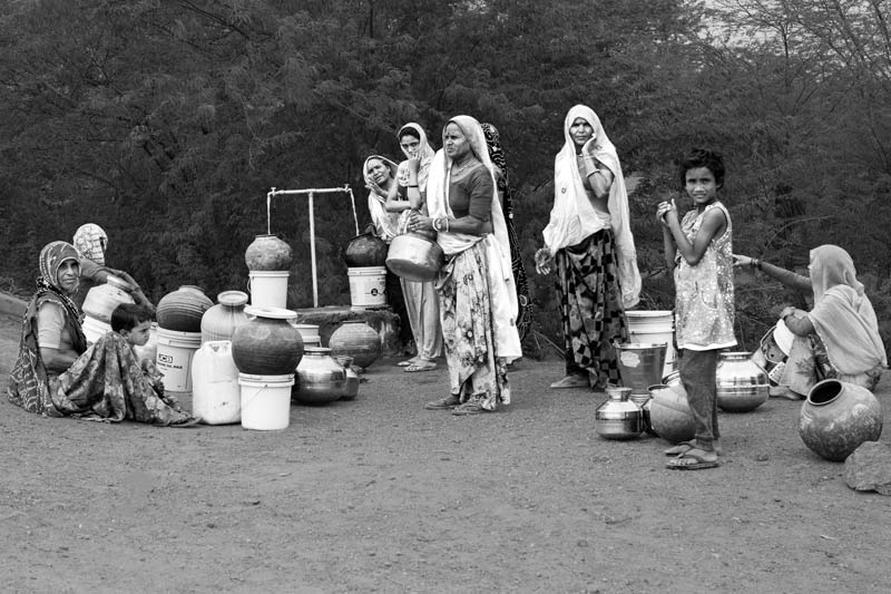 Human Right to Water in India - Waiting for their turn in uncertainty at a public tapstand in a village in district Tonk, Rajasthan